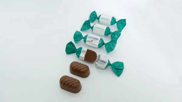 Chocolate products in protected twist wrapping style. // Theegarten-Pactec GmbH & Co. KG