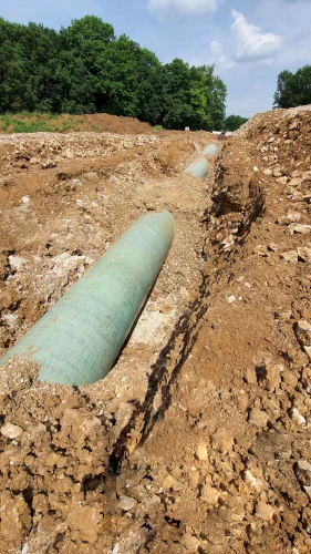 Open trench installation of a GRP coated pipeline with TDC's open trench product, pau wrap® OT