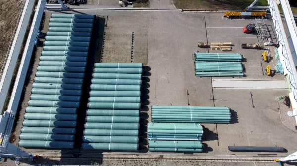 TDC International's pipe yard in Germany full of GRP coated pipes