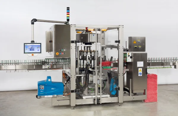 Machine for the application to aligned round products (bottles, cans, cups, etc.)
