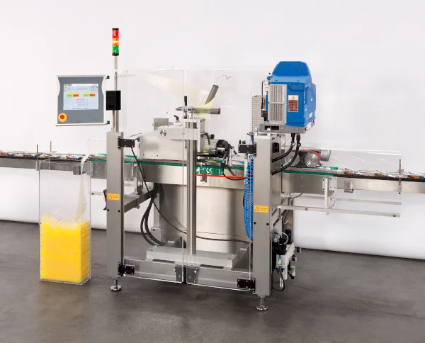 Machine for the top application on pouches