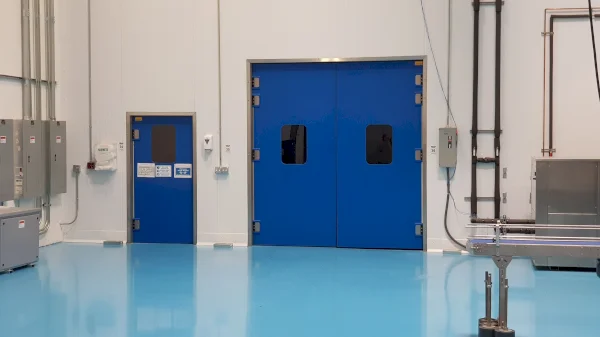 Grothaus impact traffic doors are used for personnel and large doors for forklift trucks