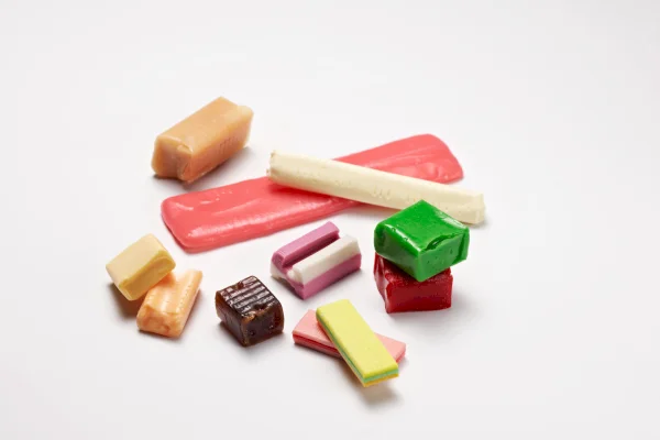 Forming, cutting and wrapping solutions for hard and soft caramels